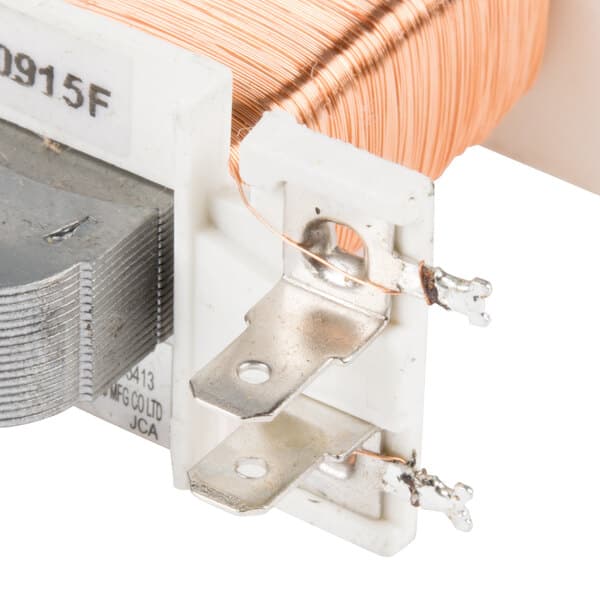 A close up of a copper wire with a metal piece.