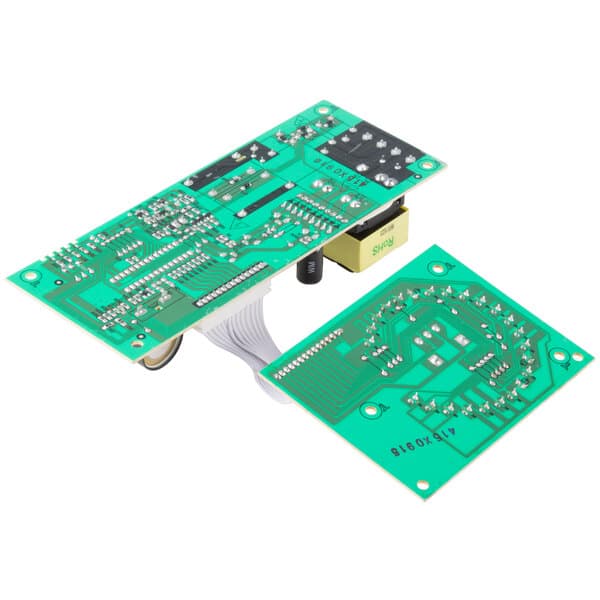 A close-up of a green Solwave PCB board with white wires.