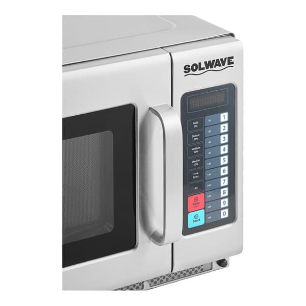 A Solwave commercial microwave with push button controls, a digital display, and a silver finish.